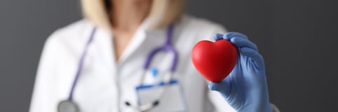doctor holding heart 